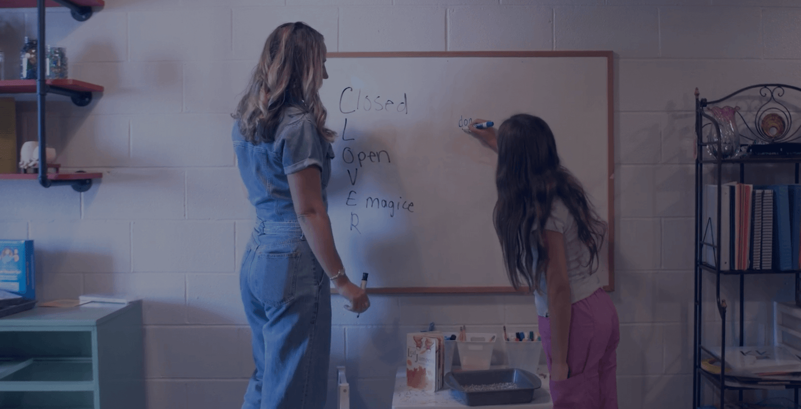 teach and student at white board